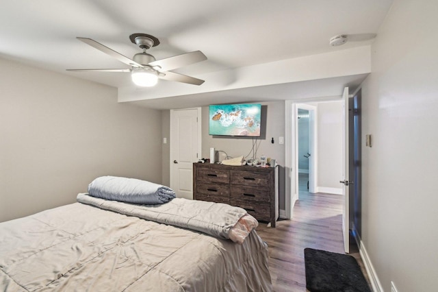 11702 Center Dr, Lemont, IL 60439 - bedroom featuring a ceiling fan, wood finished floors, and baseboards
