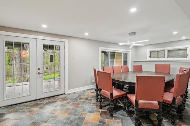 11702 Center Dr, Lemont, IL 60439 - dining space featuring baseboards, french doors, stone finish flooring, and recessed lighting