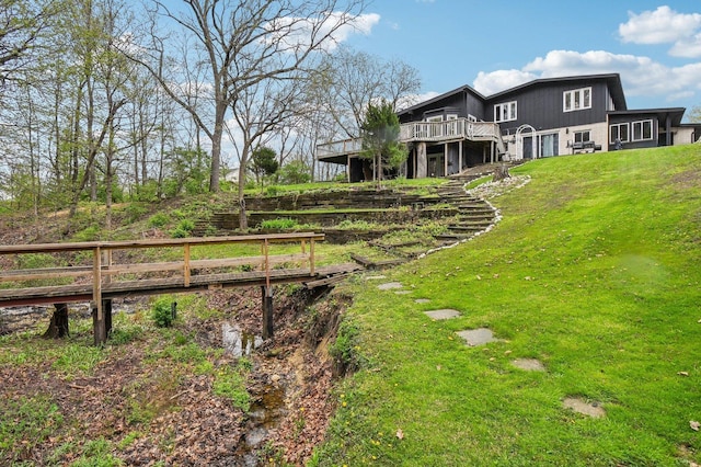 11702 Center Dr, Lemont, IL 60439 - view of yard featuring fence, a wooden deck, and stairs