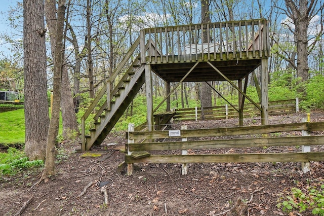 11702 Center Dr, Lemont, IL 60439 - view of community featuring stairway, a wooden deck, and fence