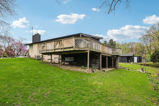 11702 Center Dr, Lemont, IL 60439 - back of property with a lawn, a chimney, a wooden deck, and central air condition unit