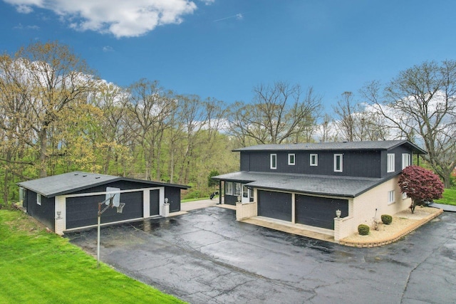 11702 Center Dr, Lemont, IL 60439 - view of front of home with an outdoor structure and a sunroom