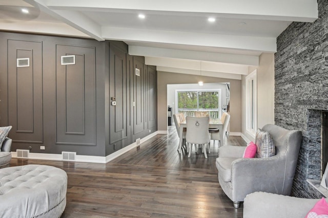 11702 Center Dr, Lemont, IL 60439 - interior space featuring dark wood finished floors, beam ceiling, and visible vents