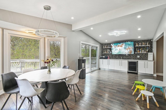 11702 Center Dr, Lemont, IL 60439 - dining space featuring wine cooler, vaulted ceiling with beams, a dry bar, and wood finished floors
