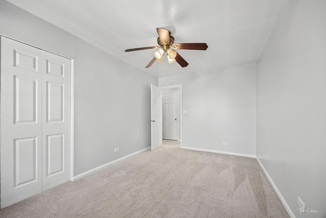 7808 Woodward Ave Unit 41-4G, Woodridge, IL 60517 - unfurnished bedroom featuring light carpet, baseboards, and ceiling fan