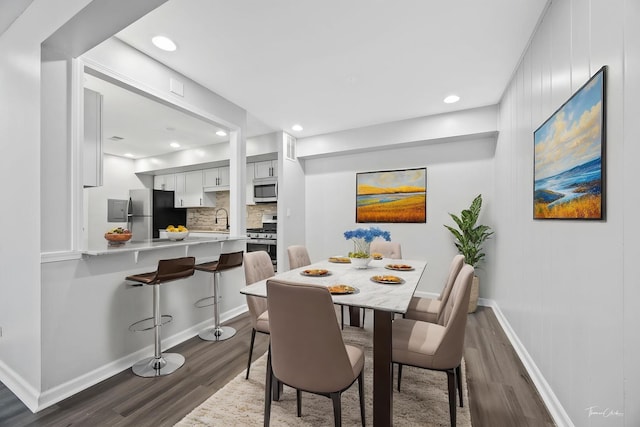 7808 Woodward Ave Unit 41-4G, Woodridge, IL 60517 - dining space with dark wood-type flooring, baseboards, and recessed lighting