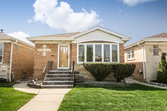 7313 W Howard Ave, Chicago, IL 60631 - view of front facade featuring a front yard and brick siding
