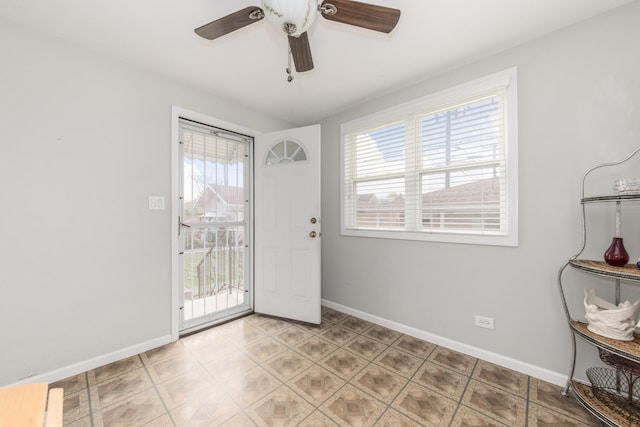7313 W Howard Ave, Chicago, IL 60631 - entryway featuring ceiling fan, baseboards, and plenty of natural light