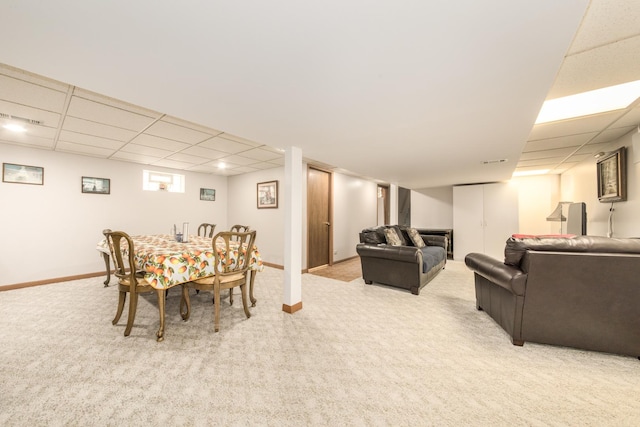 7313 W Howard Ave, Chicago, IL 60631 - dining area featuring baseboards, visible vents, light colored carpet, and a drop ceiling