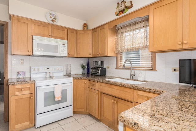 7313 W Howard Ave, Chicago, IL 60631 - kitchen featuring light stone countertops, a sink, light tile patterned flooring, backsplash, and white appliances