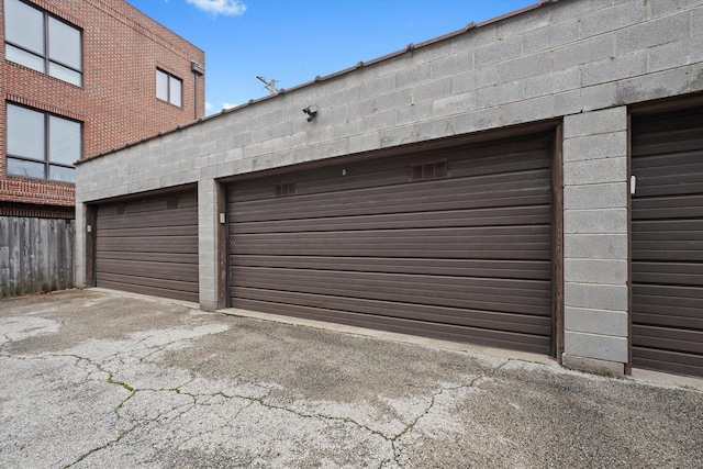 1730 W Diversey Pkwy Unit 1E, Chicago, IL 60614 - garage featuring asphalt driveway