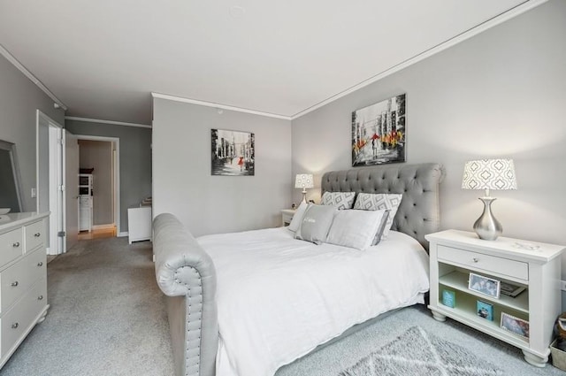 carpeted bedroom with baseboards and ornamental molding