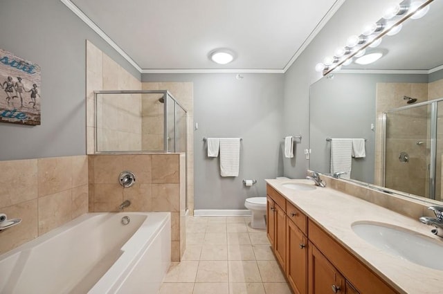 full bath with ornamental molding, a shower stall, a sink, and a bath