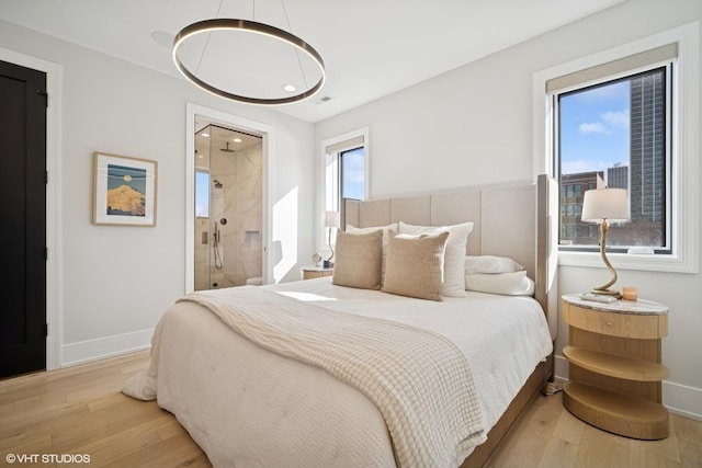 bedroom featuring recessed lighting, visible vents, light wood-style flooring, and baseboards