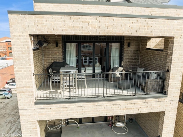 view of patio / terrace featuring a balcony