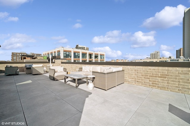 view of patio / terrace featuring a grill and an outdoor living space