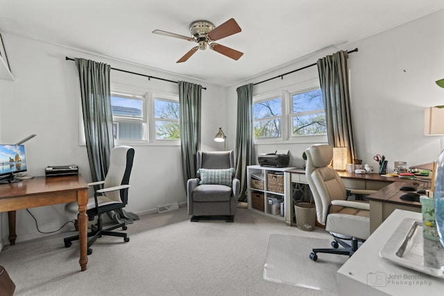 office space featuring ceiling fan and carpet floors