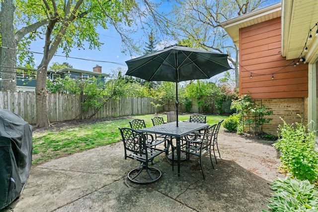 view of patio featuring outdoor dining area