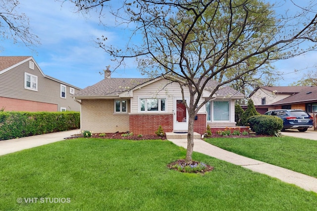 bungalow-style home featuring brick siding, a shingled roof, a front lawn, and a chimney