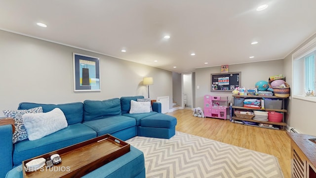 living room featuring recessed lighting and wood finished floors