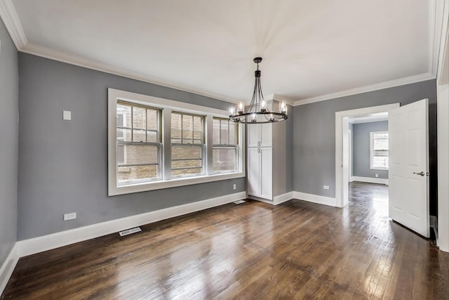 unfurnished dining area featuring a chandelier, ornamental molding, dark wood-style flooring, and baseboards
