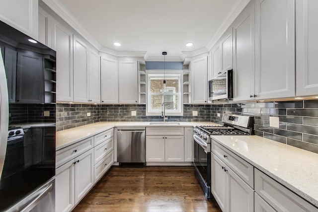kitchen with open shelves, stainless steel appliances, a sink, recessed lighting, and white cabinetry