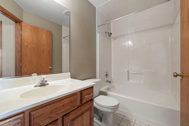 full bathroom with vanity, tile patterned flooring, washtub / shower combination, and toilet