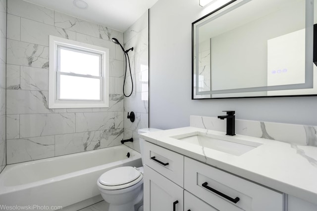 full bath featuring toilet,  shower combination, and vanity