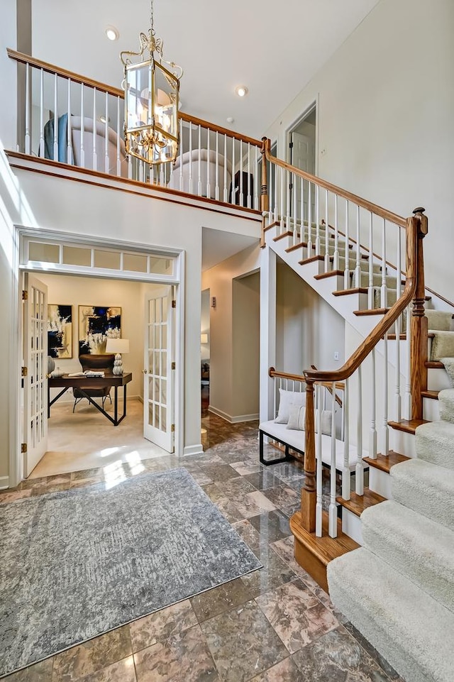 64 Huntington Ct, Burr Ridge, IL 60527 - entrance foyer with a high ceiling, french doors, stairs, a chandelier, and recessed lighting