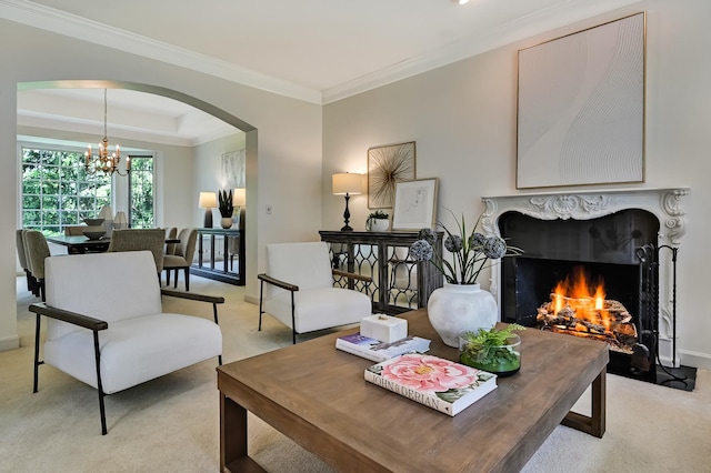 64 Huntington Ct, Burr Ridge, IL 60527 - living room with arched walkways, a chandelier, light colored carpet, a high end fireplace, and ornamental molding