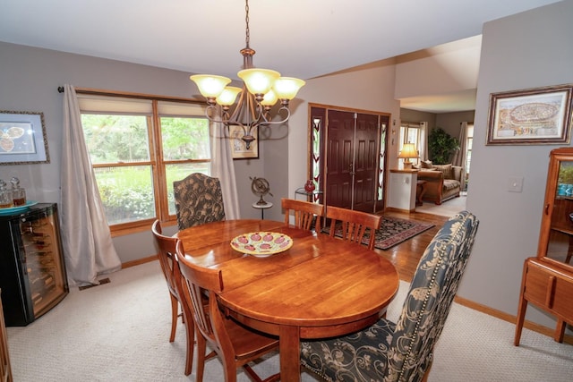 600 Salceda Dr, Mundelein, IL 60060 - dining space with a chandelier, baseboards, and light colored carpet