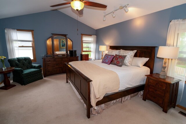 600 Salceda Dr, Mundelein, IL 60060 - bedroom with lofted ceiling, light carpet, track lighting, and ceiling fan