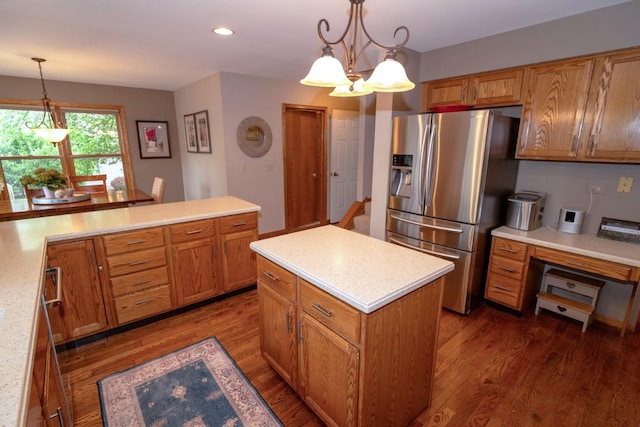 600 Salceda Dr, Mundelein, IL 60060 - kitchen with stainless steel fridge, dark wood finished floors, light countertops, brown cabinets, and recessed lighting