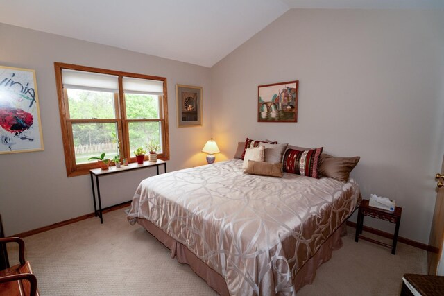 600 Salceda Dr, Mundelein, IL 60060 - bedroom with light carpet, lofted ceiling, and baseboards