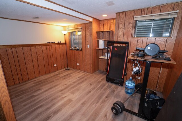 600 Salceda Dr, Mundelein, IL 60060 - kitchen featuring wood walls, brown cabinets, and wood finished floors