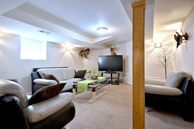 living area featuring light carpet