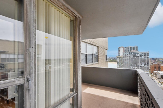 balcony featuring a city view