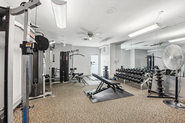exercise room with carpet floors and ceiling fan