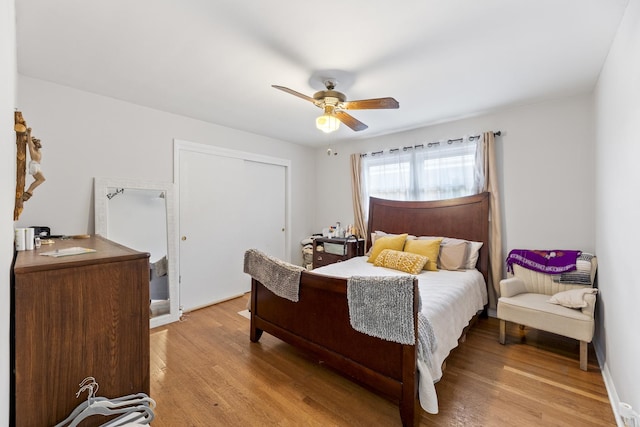 8515 S Kildare Ave, Chicago, IL 60652 - bedroom featuring a ceiling fan, light wood finished floors, and a closet