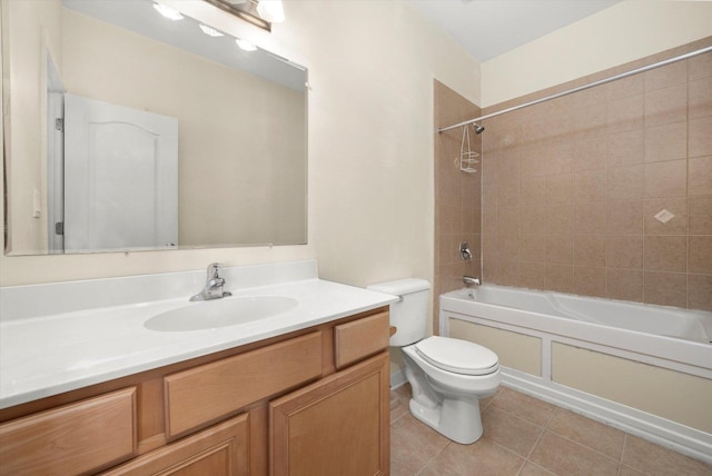 full bath featuring tile patterned floors, shower / bathing tub combination, toilet, and vanity