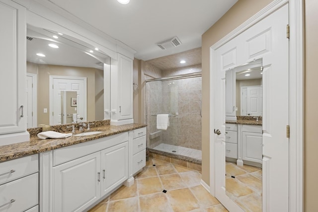 1401 Burr Oak Rd Unit 116B, Hinsdale, IL 60521 - full bathroom with visible vents, tile patterned flooring, vanity, recessed lighting, and a stall shower