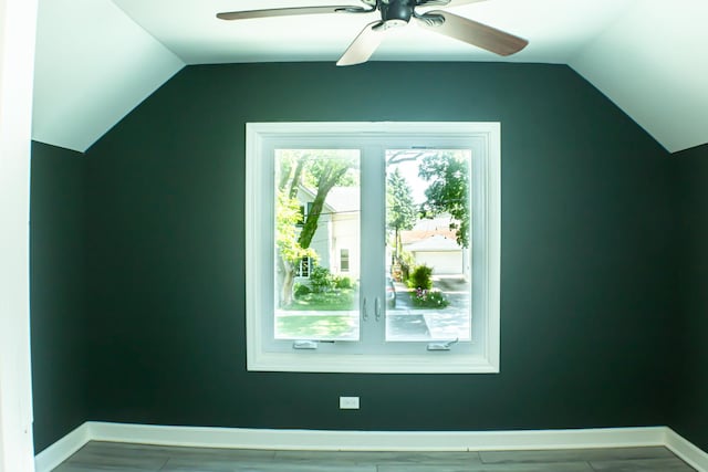 227 E 6th St, Lockport, IL 60441 - additional living space with lofted ceiling, a ceiling fan, and baseboards