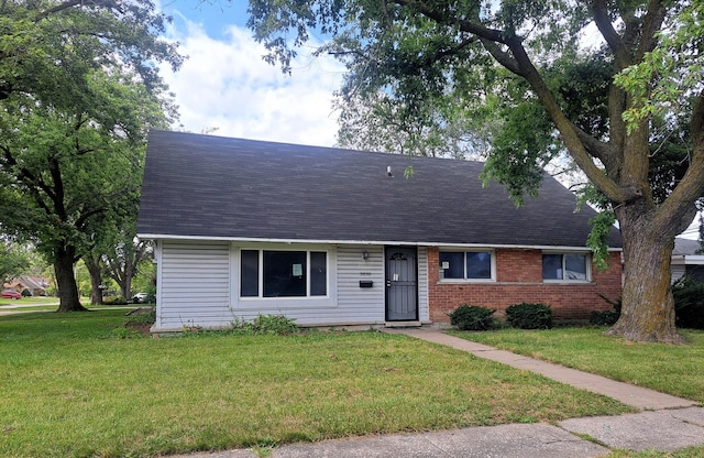 3830 167th Pl, Country Club Hills, IL 60478 - view of front of home with roof with shingles, a front yard, and brick siding