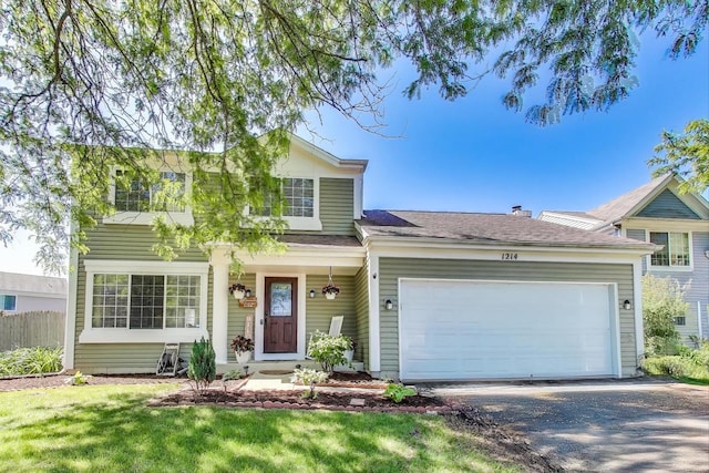 1214 Lone Oak Trl, Aurora, IL 60506 - view of front of property featuring a garage and asphalt driveway