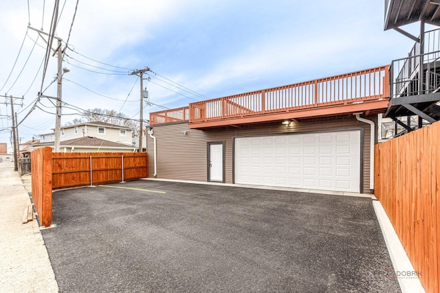 garage featuring fence