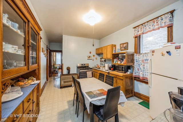2534 S Christiana Ave, Chicago, IL 60623 - kitchen with appliances with stainless steel finishes, a wealth of natural light, and light floors