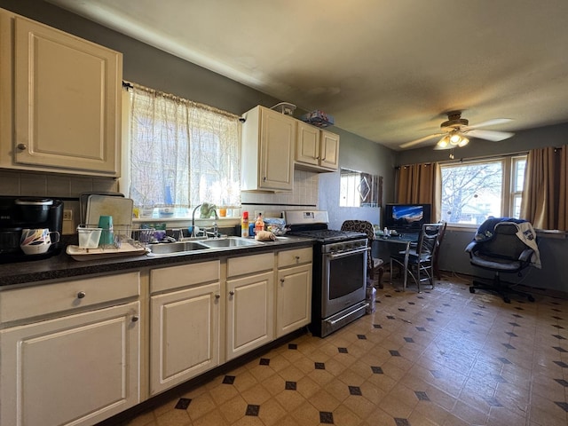 10434 S Green St, Chicago, IL 60643 - kitchen with stainless steel gas stove, dark countertops, decorative backsplash, and a sink