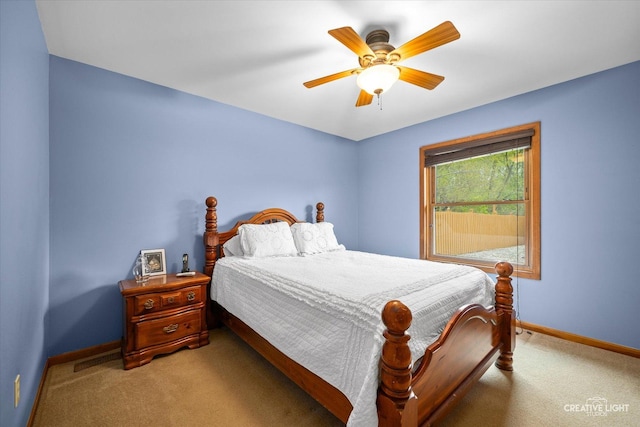 911 E Main St, Plano, IL 60545 - bedroom featuring light colored carpet, baseboards, and a ceiling fan