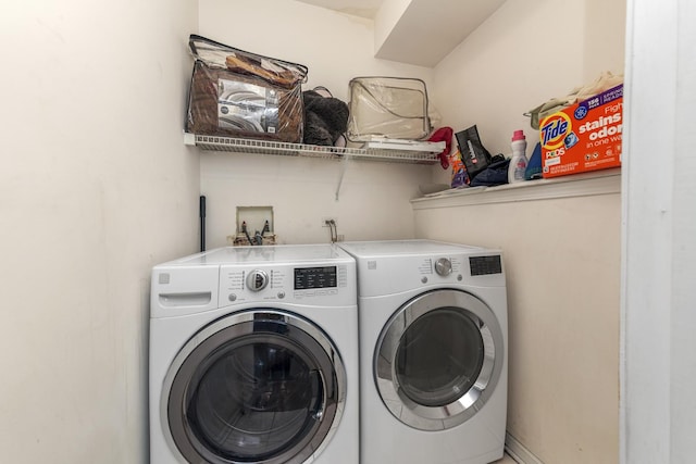 535 N Wood St, Chicago, IL 60622 - clothes washing area featuring washer and dryer and laundry area
