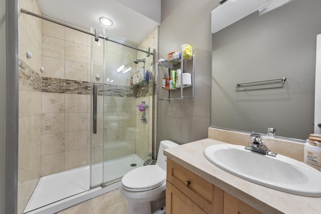 535 N Wood St, Chicago, IL 60622 - full bathroom featuring vanity, toilet, a shower stall, and tile patterned flooring